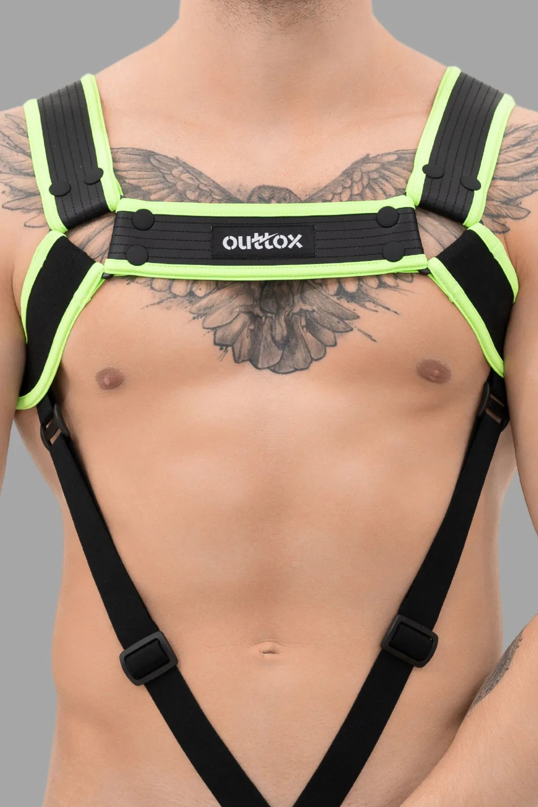 Outtox. Arnês de corpo com fechos de pressão. Preto e verde 'Neon'