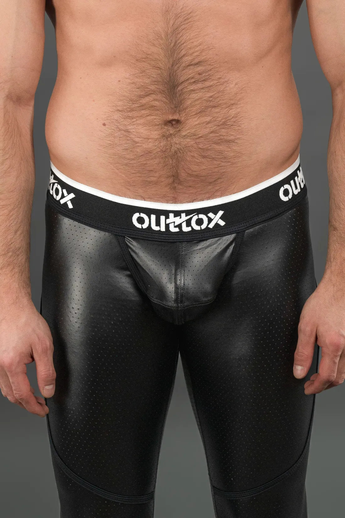 Outtox. Leggings traseiras com zíper e tapa-sexo de pressão. Preto