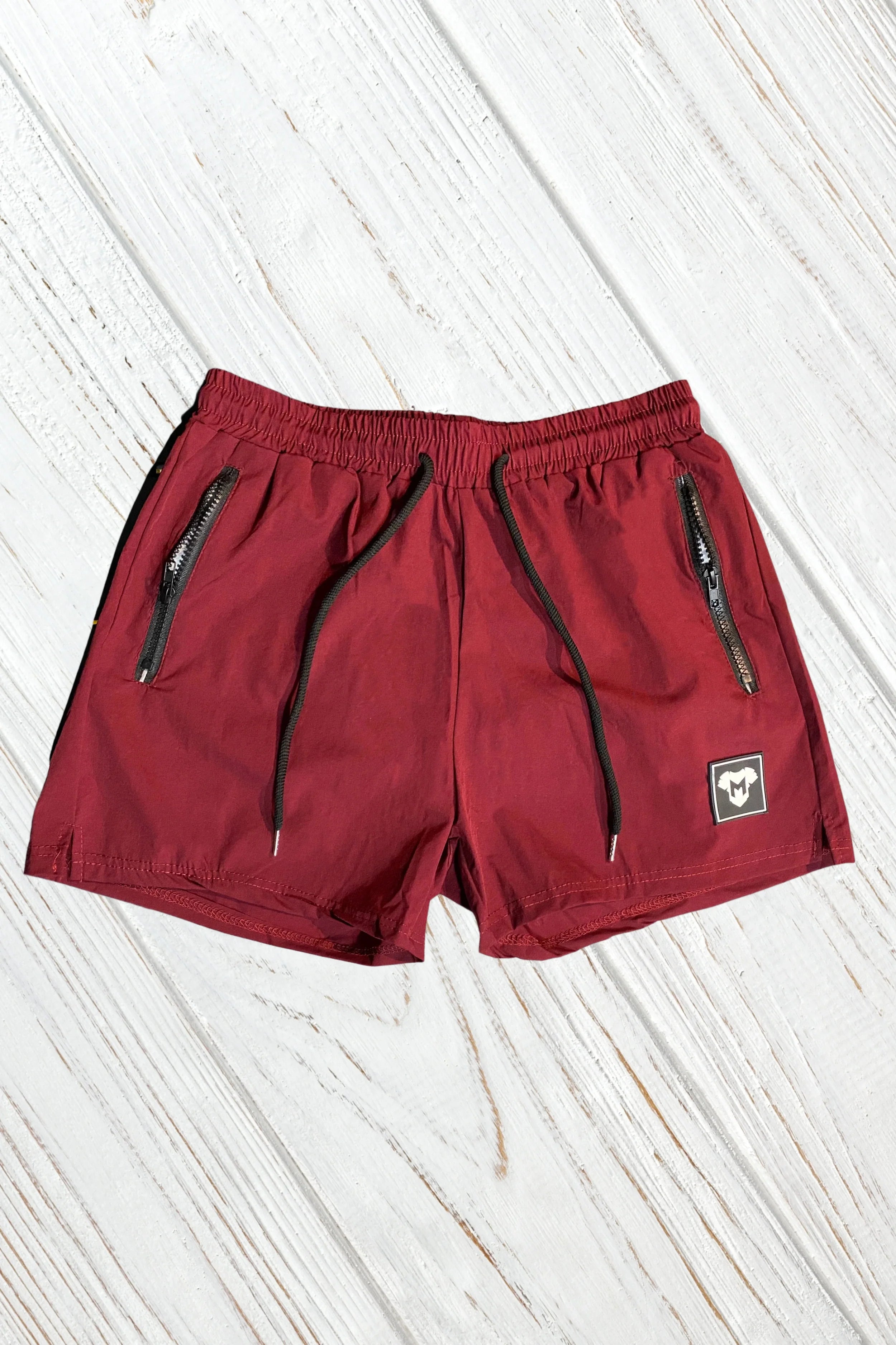 Jedd Synther soft shorts with zip pockets. Red Dark